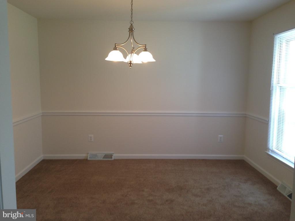 88 Leeland Road Fredericksburg, VA 22405 - Photo 3 of 22 a view of a chandelier in big room