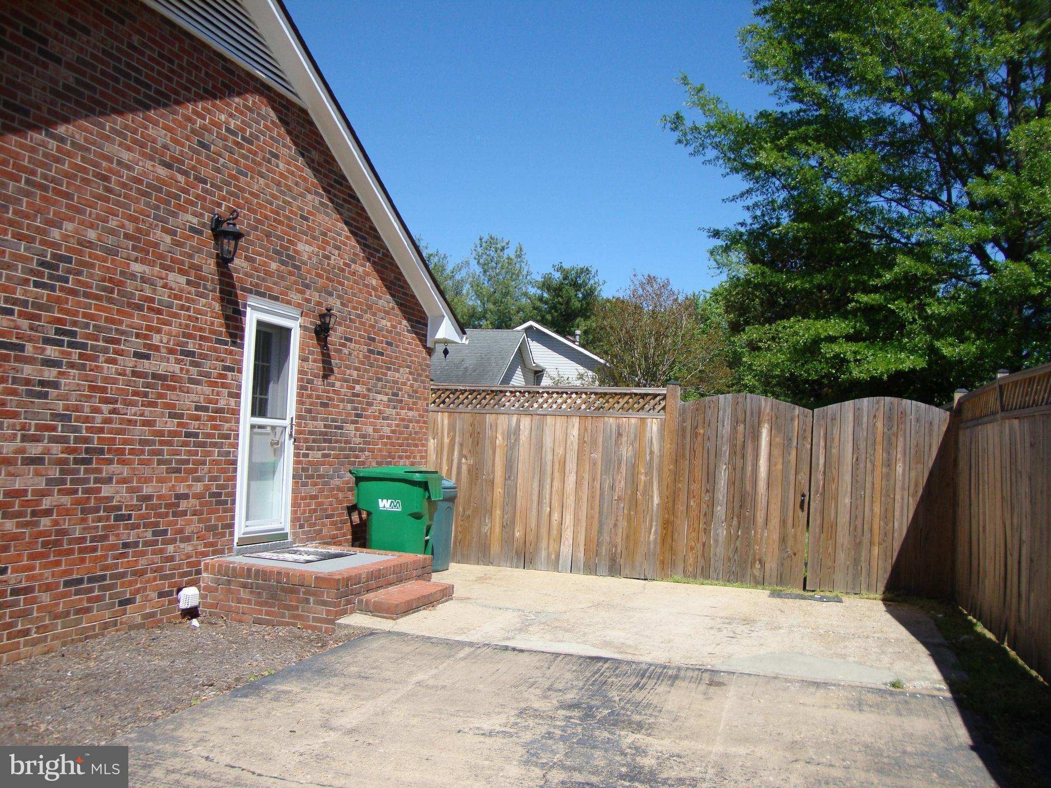 88 Leeland Road Fredericksburg, VA 22405 - Photo 22 of 22 a backyard of a house