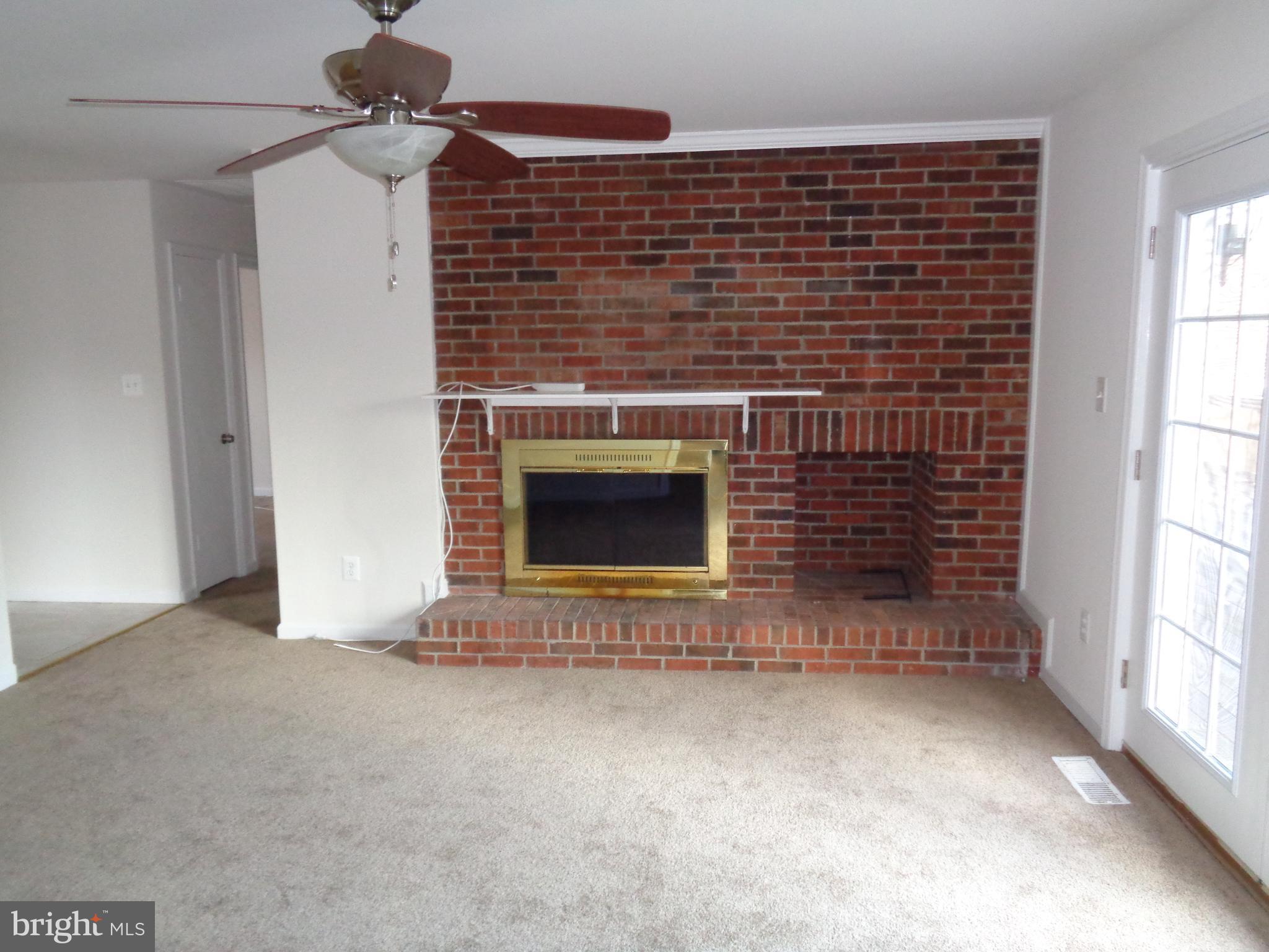88 Leeland Road Fredericksburg, VA 22405 - Photo 5 of 22 a view of fireplace and window