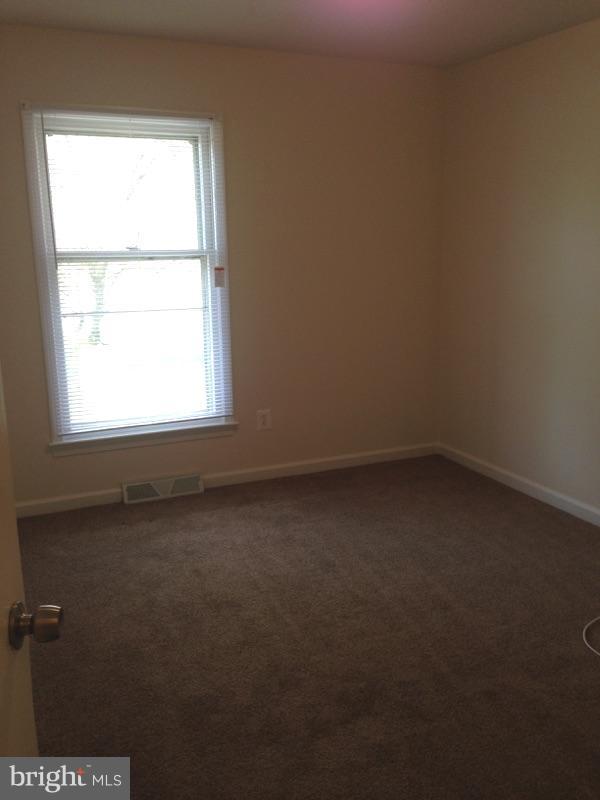 88 Leeland Road Fredericksburg, VA 22405 - Photo 6 of 22 an empty room with a window