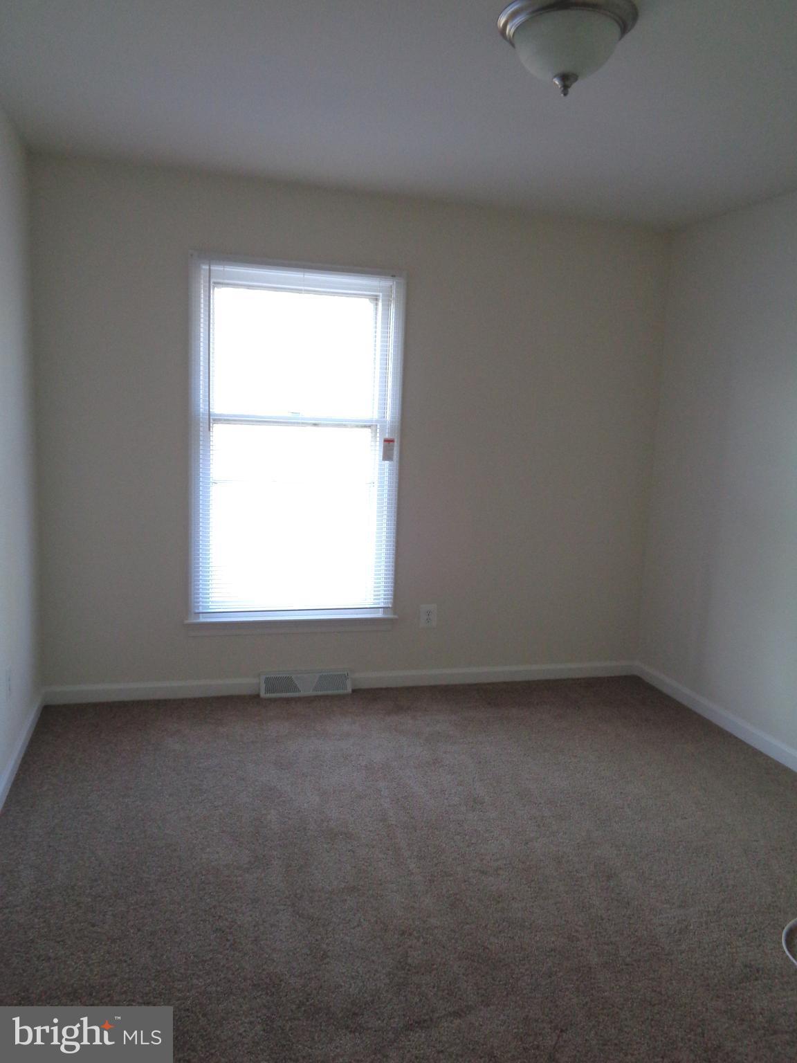 88 Leeland Road Fredericksburg, VA 22405 - Photo 7 of 22 an empty room with a window
