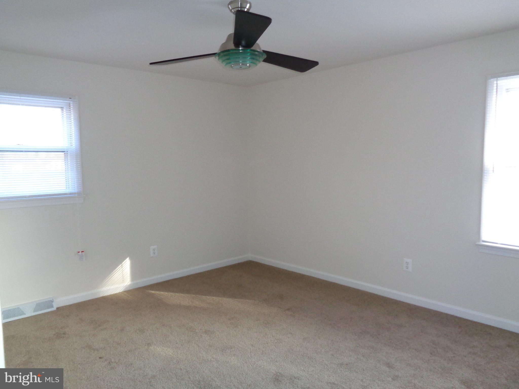 88 Leeland Road Fredericksburg, VA 22405 - Photo 9 of 22 a view of an empty room with a window