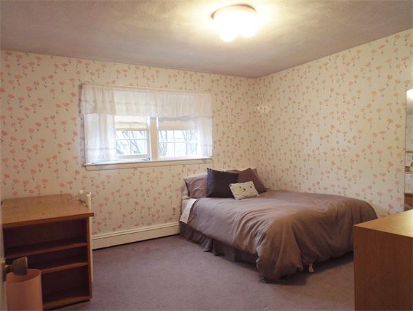 239 Worthen Road East Lexington, MA 02421 - Photo 11 of 13 a bedroom with a bed and a desk