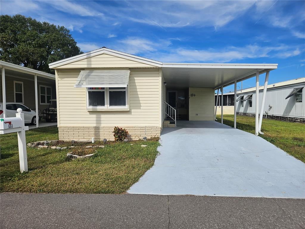 front view of a house with a yard