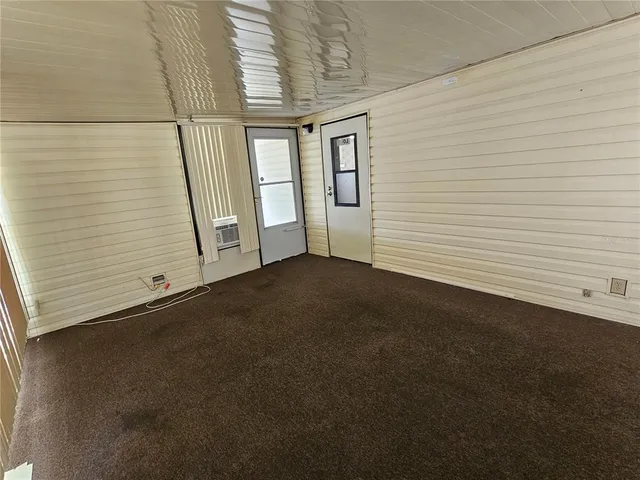 a view of a room that has a window