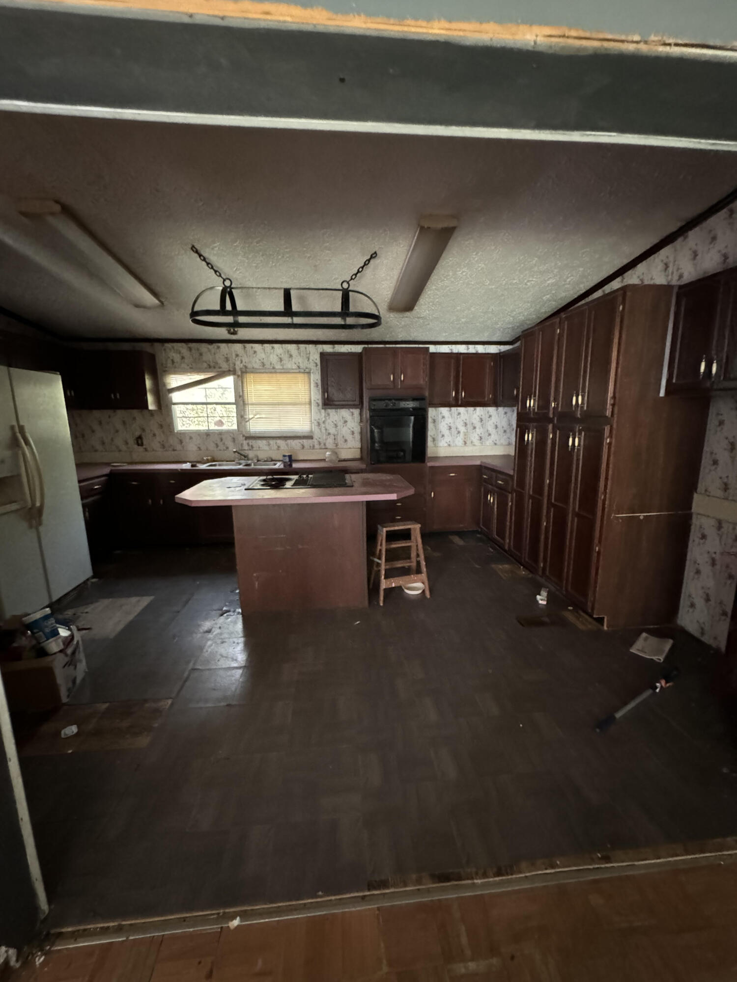 7871 Highway 4 Jay, FL 32565 - Photo 9 of 10 a kitchen with a refrigerator and a counter top