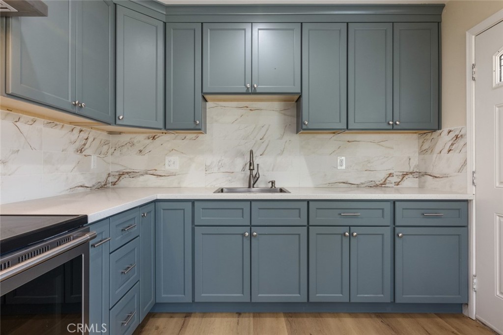 19247 3rd Stevinson, CA 95374 - Photo 13 of 50 a kitchen with granite countertop cabinets and sink
