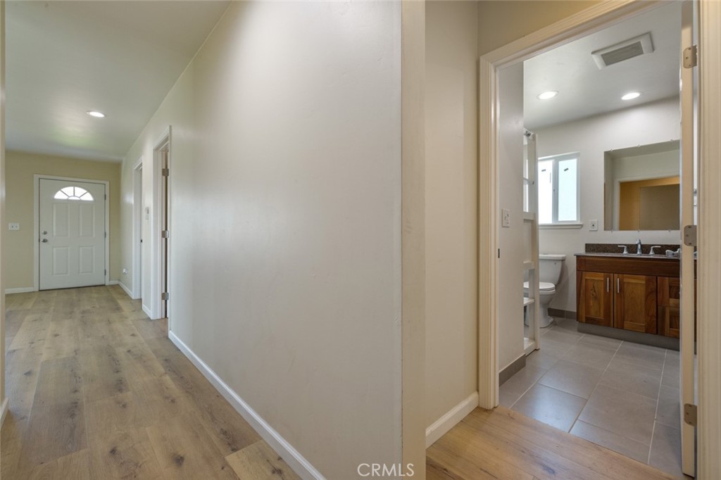 19247 3rd Stevinson, CA 95374 - Photo 21 of 50 a view of a hallway and a livingroom with a bathroom