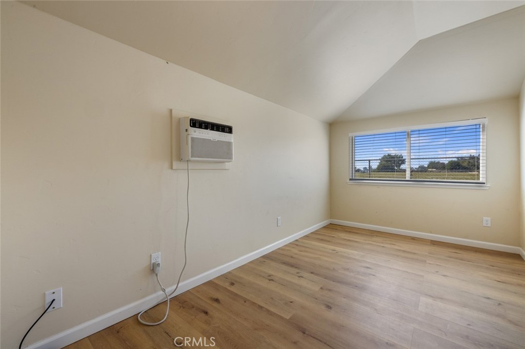 19247 3rd Stevinson, CA 95374 - Photo 26 of 50 a view of a room with wooden floor and window