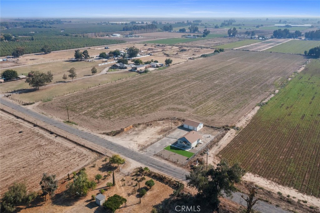 19247 3rd Stevinson, CA 95374 - Photo 40 of 50 an aerial view of a house with a yard