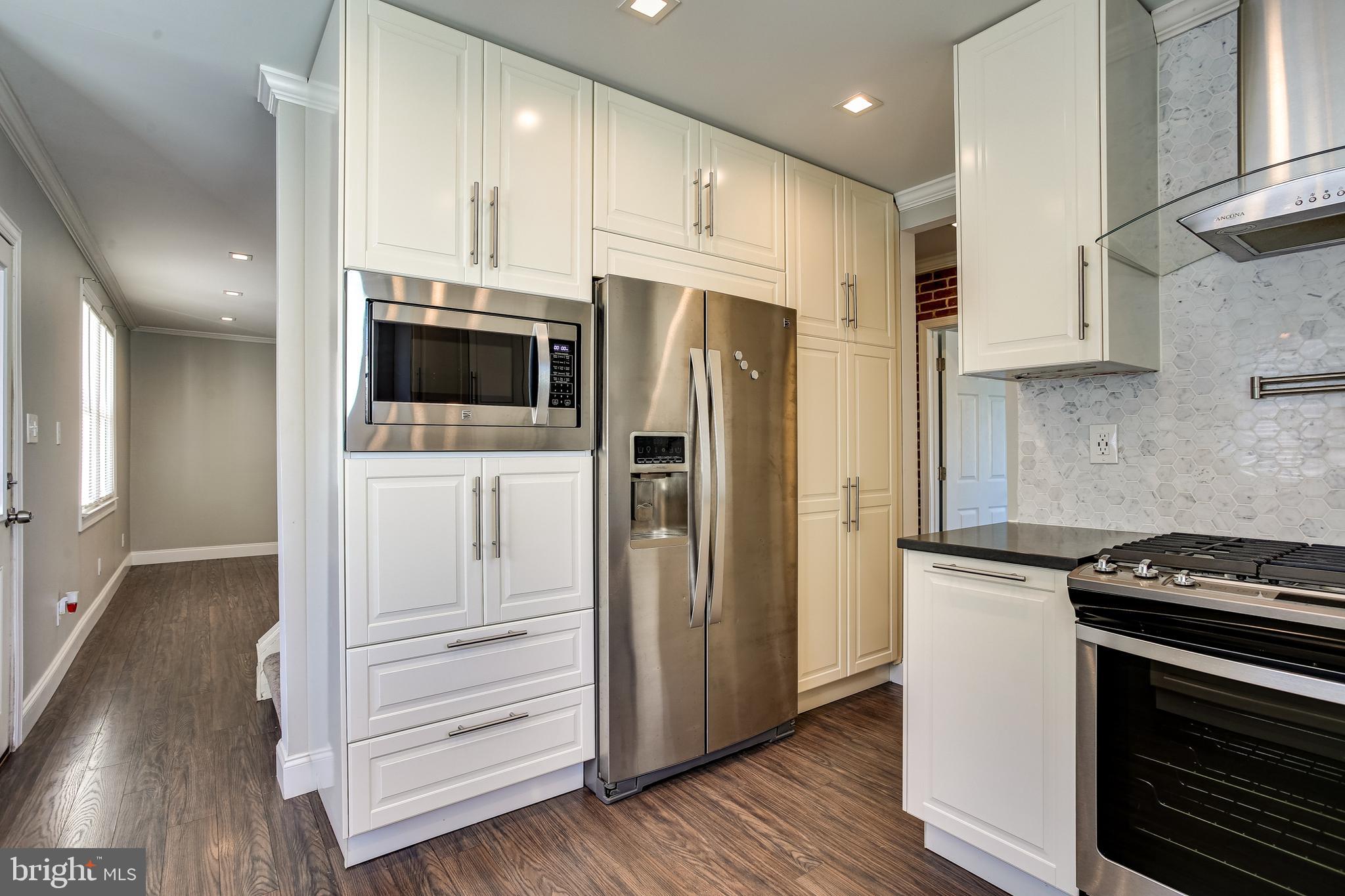 2605 Lynbrook Road Baltimore, MD 21222 - Photo 7 of 34 Kitchen w/ SS Appl: Built-In Microwave & Gas Stove