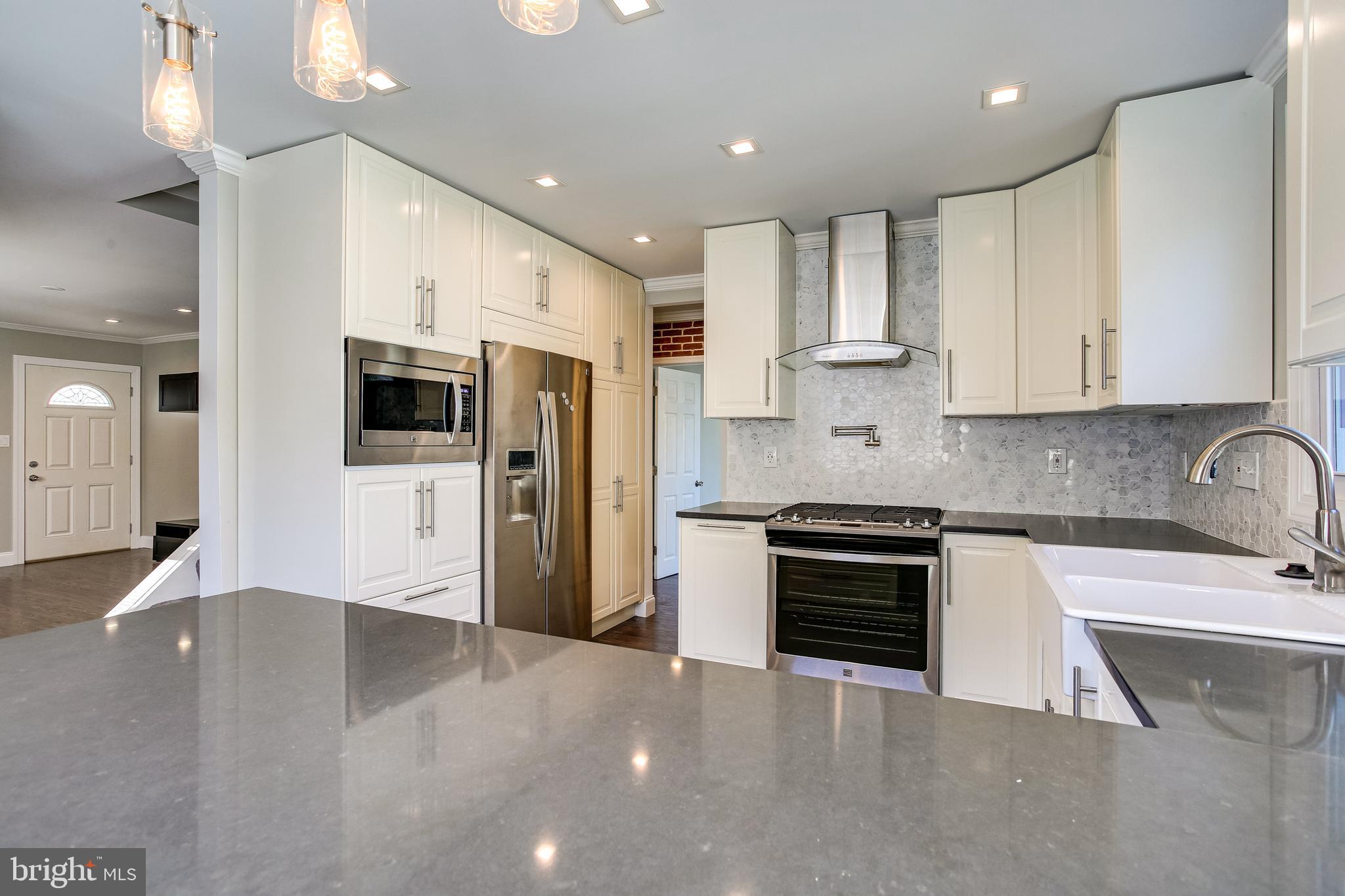 2605 Lynbrook Road Baltimore, MD 21222 - Photo 8 of 34 Kitchen w/ Quartz Counters & Double Farm Sink
