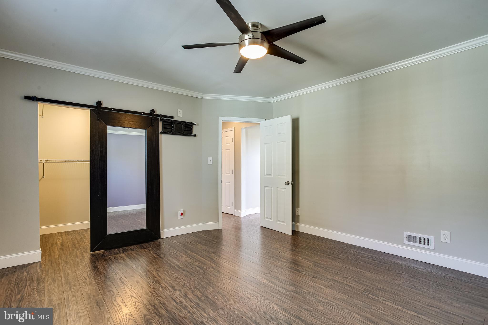 2605 Lynbrook Road Baltimore, MD 21222 - Photo 9 of 34 Bedroom 1 w/ Walk-in Closet & Barn Door