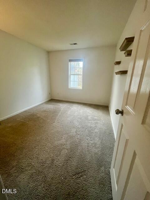 6016 River Lake Circle Raleigh, NC 27604 - Photo 14 of 15 a view of a big room with windows