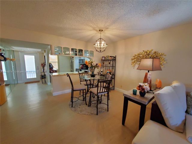 a living room with furniture and a gate