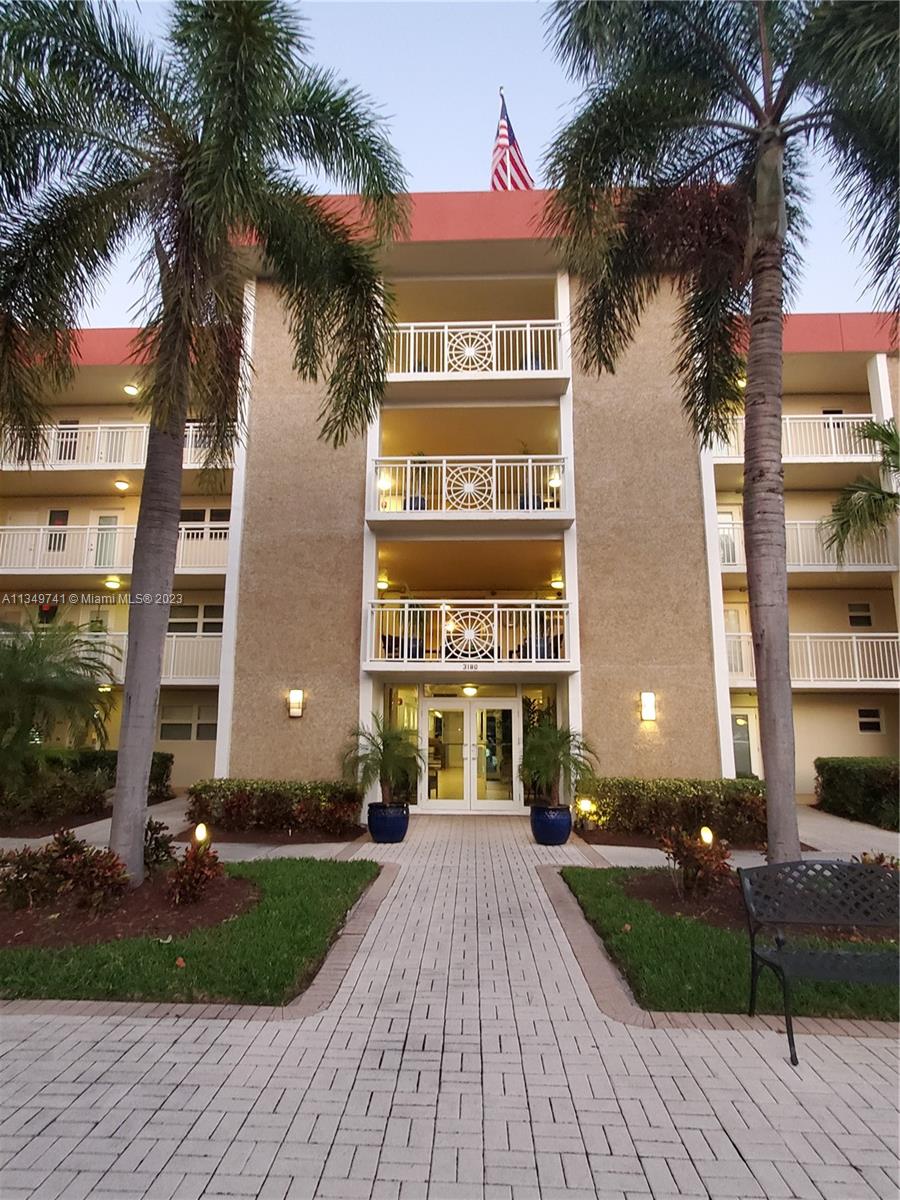 Lighthouse Point Lighthouse Point, FL 33064 - Photo 2 of 52 a front view of building with yard