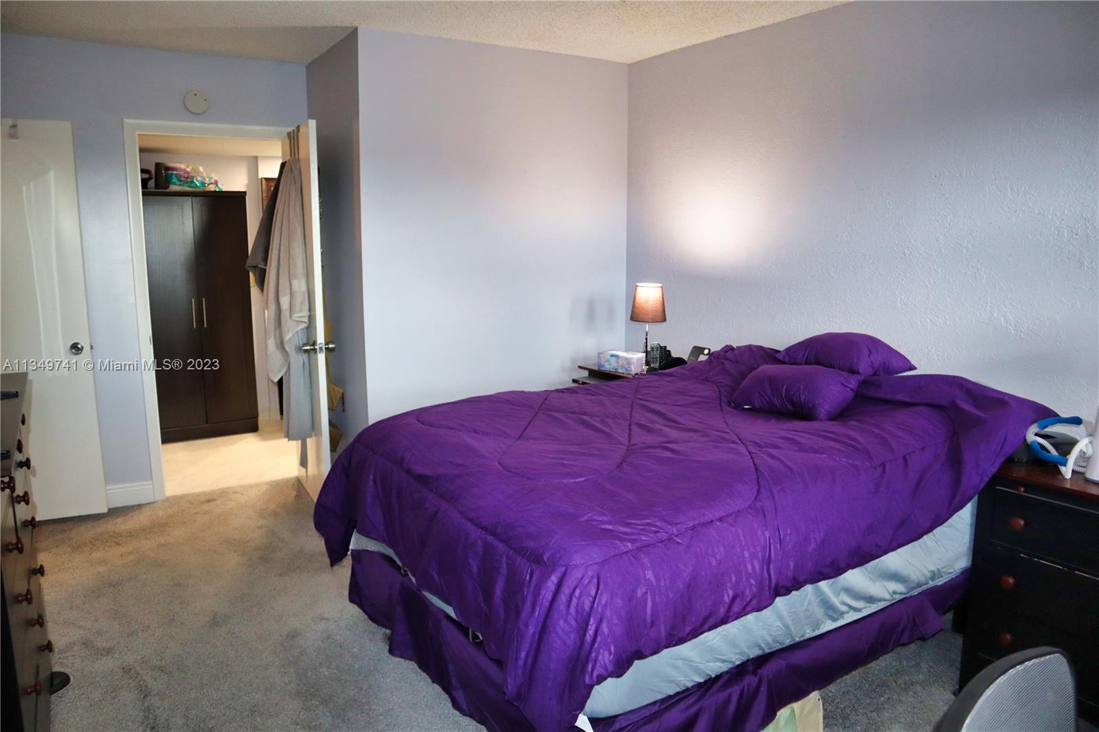 Lighthouse Point Lighthouse Point, FL 33064 - Photo 21 of 52 a bedroom with a bed and closet