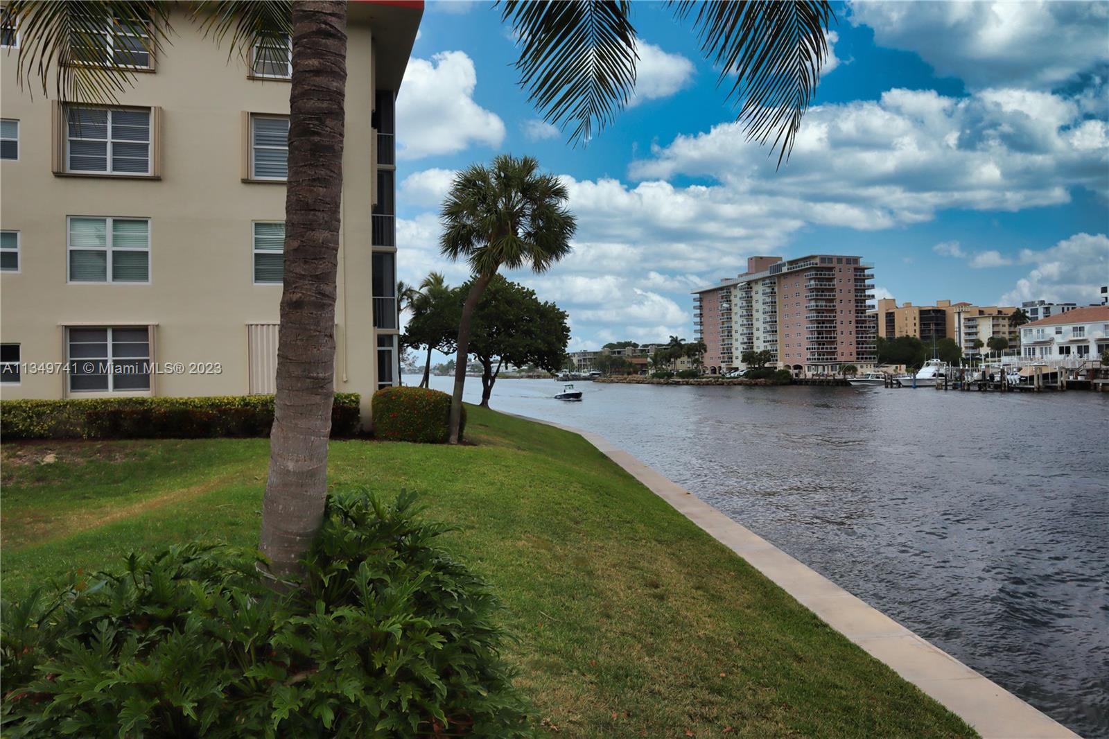 Lighthouse Point Lighthouse Point, FL 33064 - Photo 32 of 52 a view of a street with a building in the background