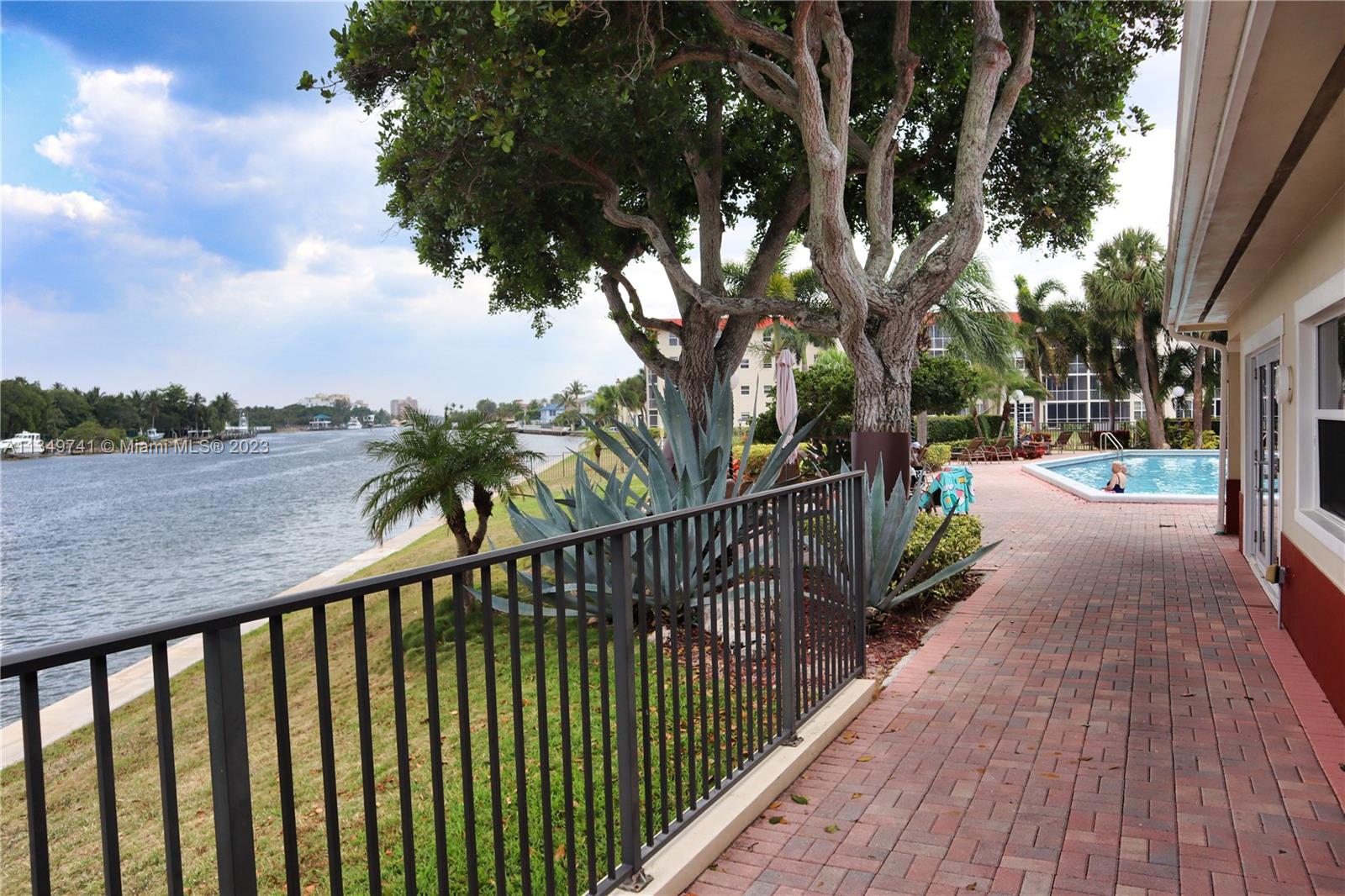 Lighthouse Point Lighthouse Point, FL 33064 - Photo 33 of 52 a balcony with wooden floor and city view