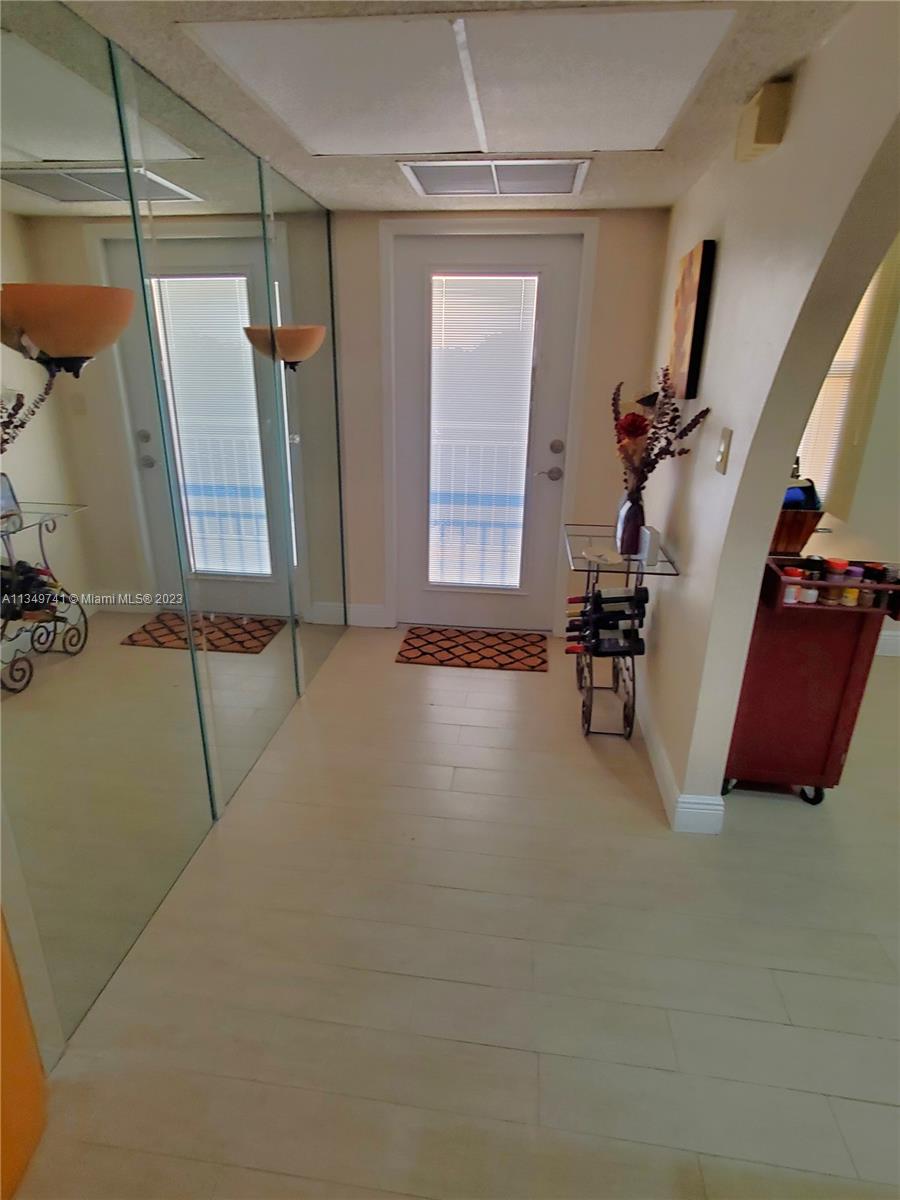 Lighthouse Point Lighthouse Point, FL 33064 - Photo 4 of 52 a view of a room with gym equipment