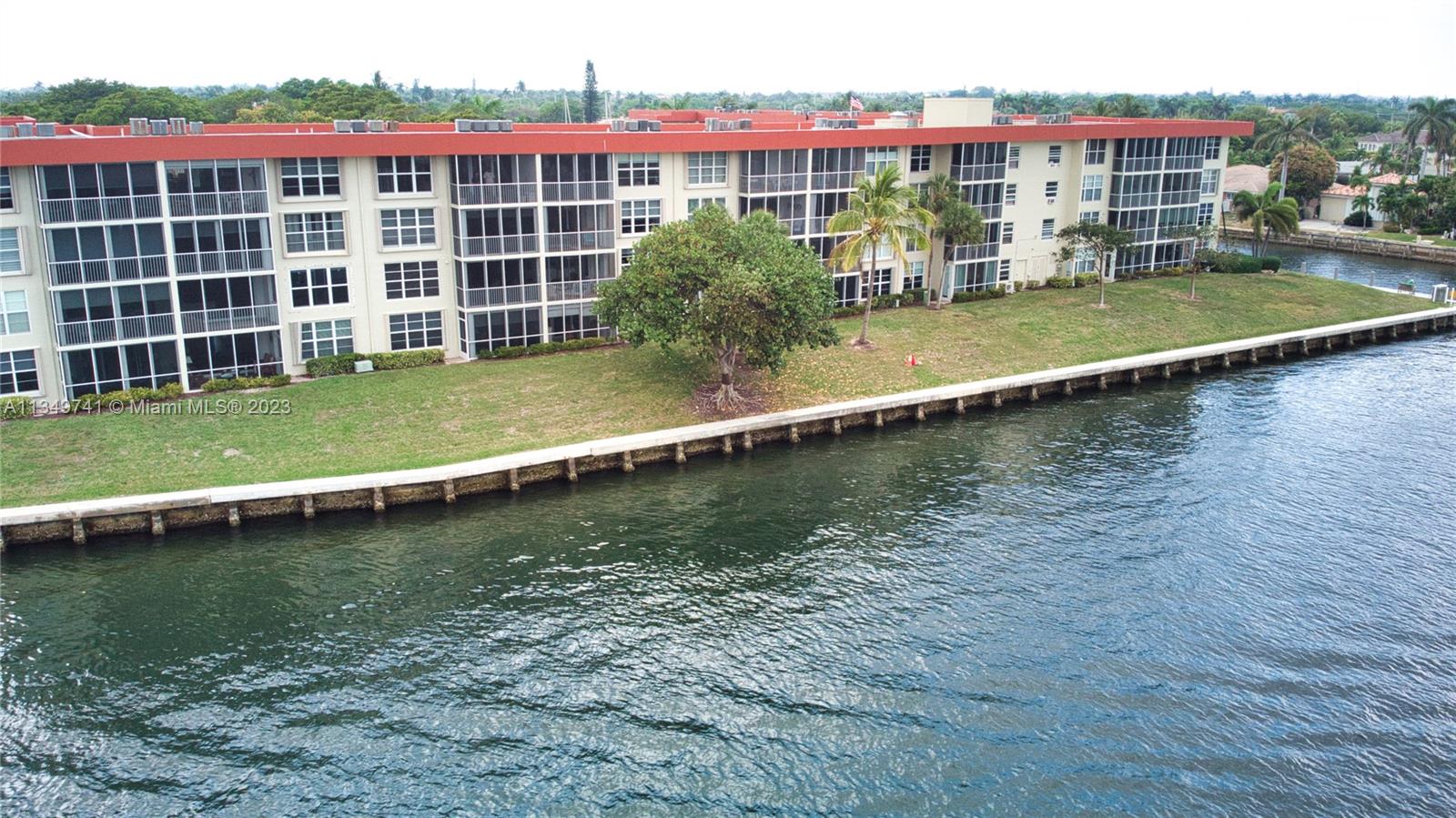 Lighthouse Point Lighthouse Point, FL 33064 - Photo 41 of 52 a view of a swimming pool with a lake view