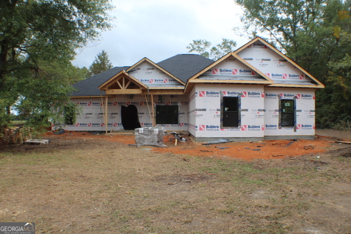 a front view of a house with patio