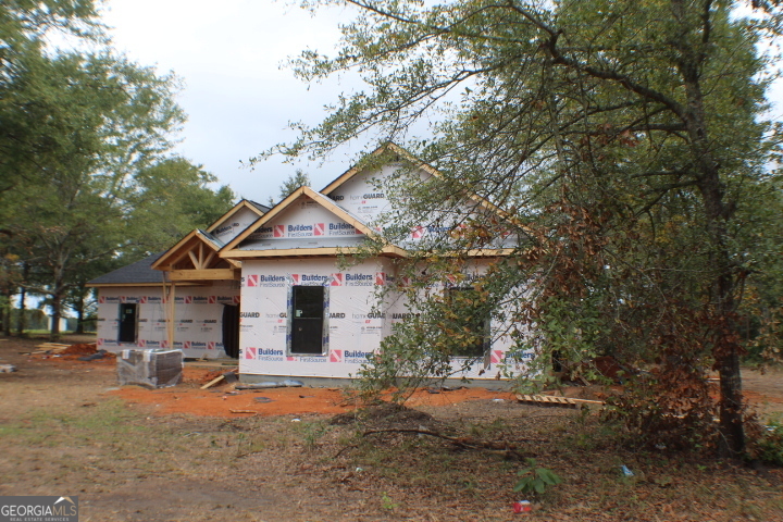 2767 Claxton Dairy Road Dublin, GA 31021 - Photo 2 of 4 a view of a house with a yard