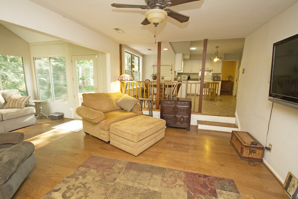 816 Harris Road Charlottesville, VA 22902 - Photo 15 of 28 a living room with furniture and a flat screen tv