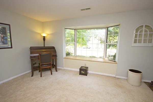 816 Harris Road Charlottesville, VA 22902 - Photo 16 of 28 a room with furniture and a window
