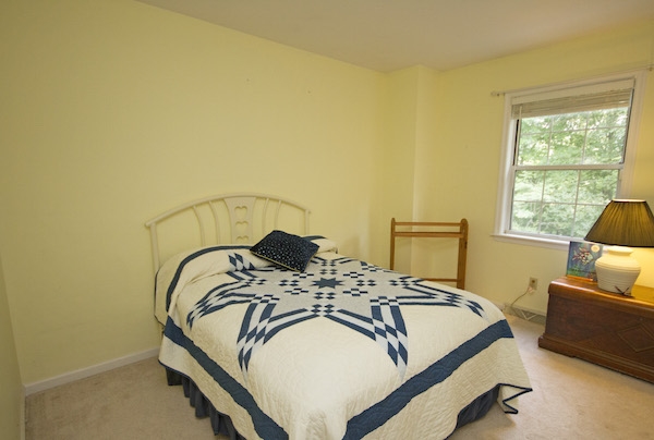 816 Harris Road Charlottesville, VA 22902 - Photo 23 of 28 a bedroom with a bed and a couch