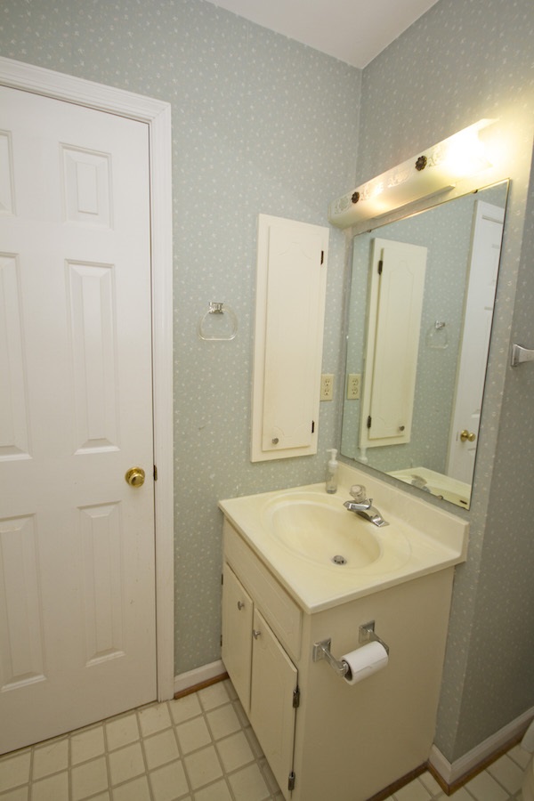 816 Harris Road Charlottesville, VA 22902 - Photo 27 of 28 a bathroom with a sink a mirror and a shower