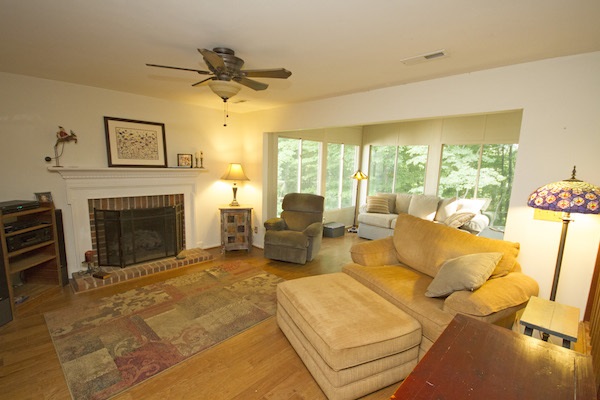 816 Harris Road Charlottesville, VA 22902 - Photo 10 of 28 a living room with furniture and a fireplace