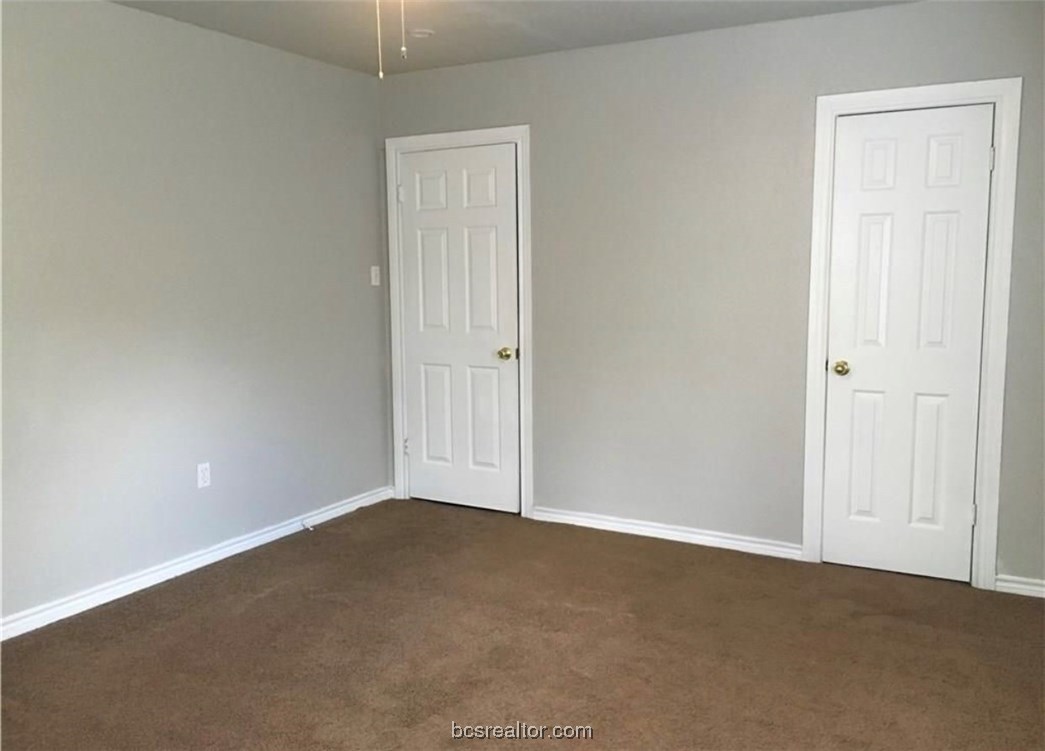 718 Edgewood Drive Bryan, TX 77802 - Photo 10 of 12 a view of an empty room and entryway