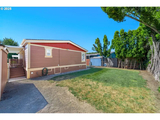 a view of a backyard with a garden
