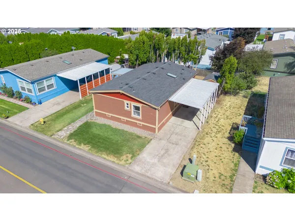 an aerial view of a house with a garden