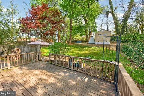 a view of a wrought iron fences in front of house
