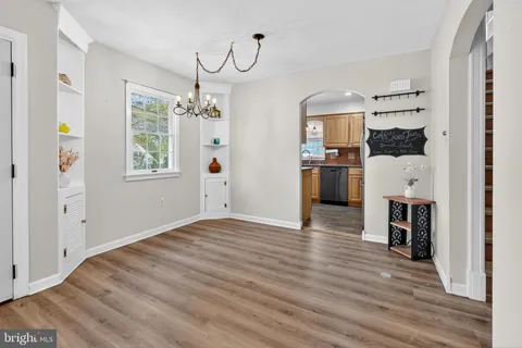 a view of a living room and a kitchen