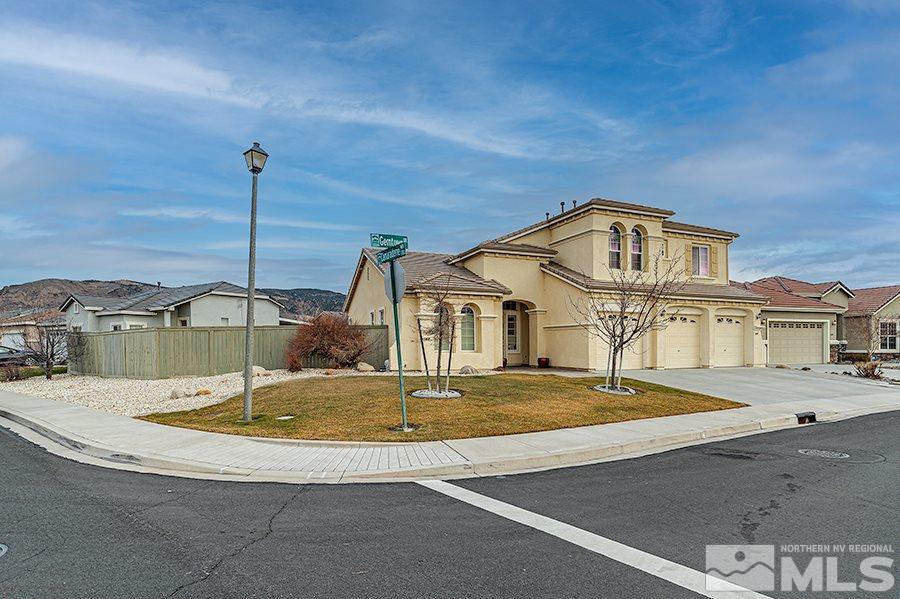 1698 Gemtown Drive Reno, NV 89521 - Photo 18 of 18 a view of a house with a swimming pool