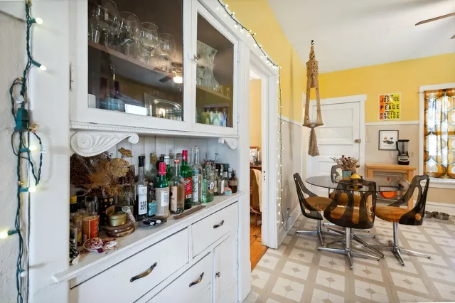 a view of an chairs and tables in the balcony