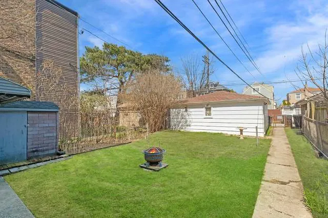a view of a back yard of the house