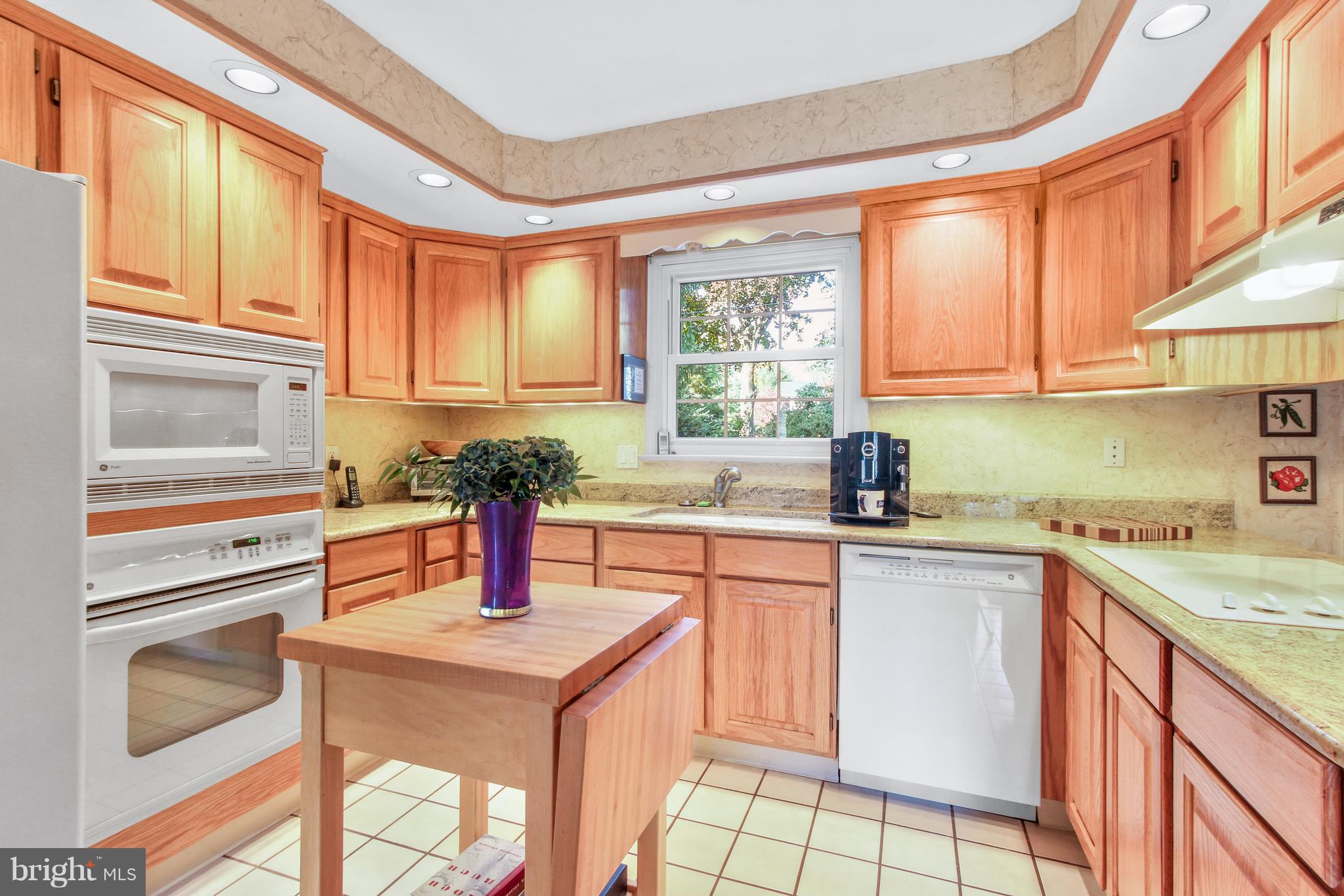 2846 Brookfield Road Lancaster, PA 17601 - Photo 5 of 29 a kitchen with stainless steel appliances granite countertop a stove a sink and a refrigerator