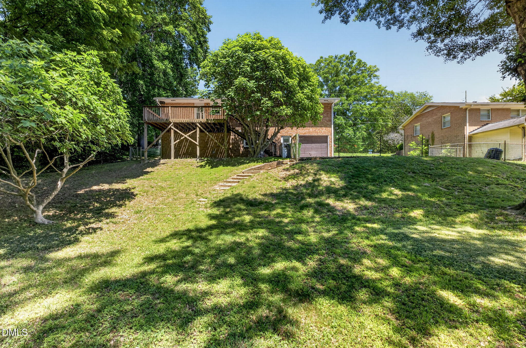 1224 Pineview Drive Raleigh, NC 27606 - Photo 40 of 45 a backyard of a house with yard and outdoor seating