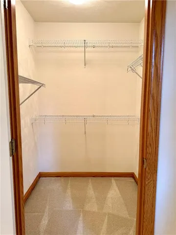 a view of a room with racks on the wall