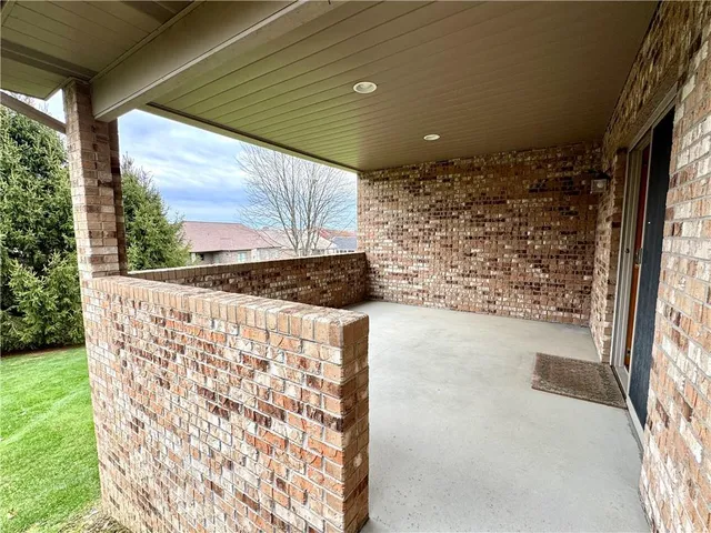 a view of entryway with a front door and porch