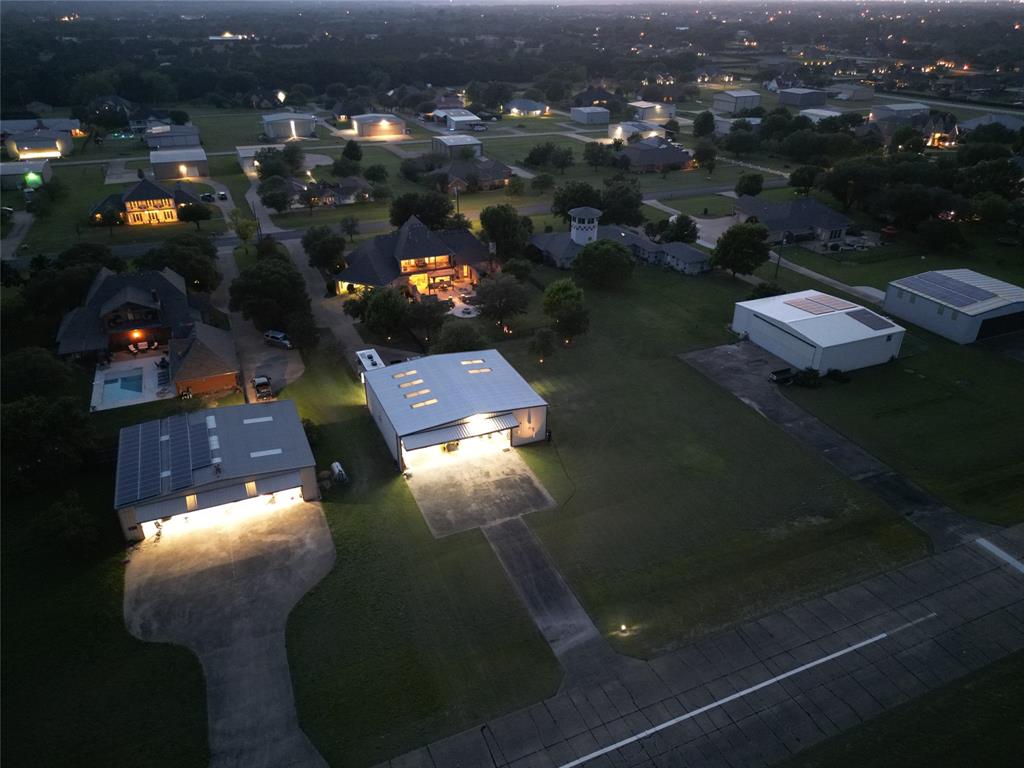 2930 Falcon Way Midlothian, TX 76065 - Photo 32 of 40 an aerial view of a house with a yard lake lake and outdoor seating