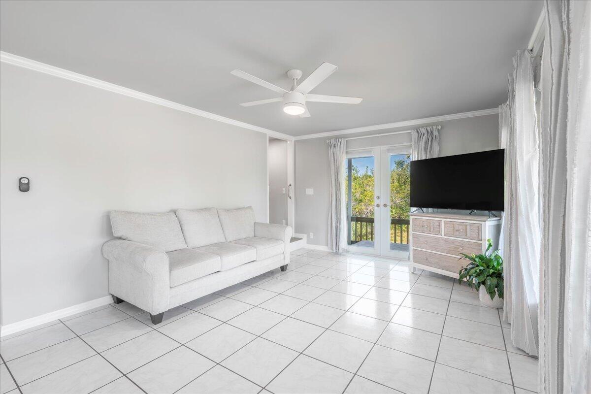 3167 Stewart Road Summerland Key, FL 33042 - Photo 13 of 33 a living room with furniture and a flat screen tv