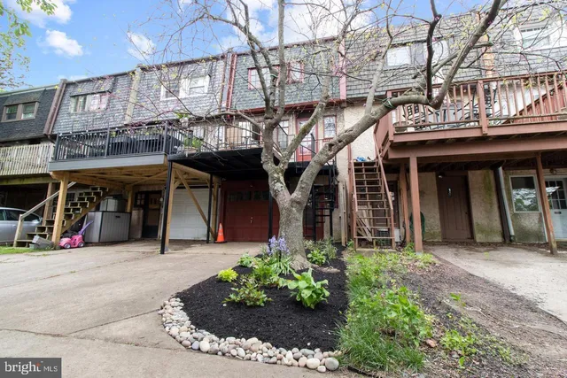 a view of a building with sitting area