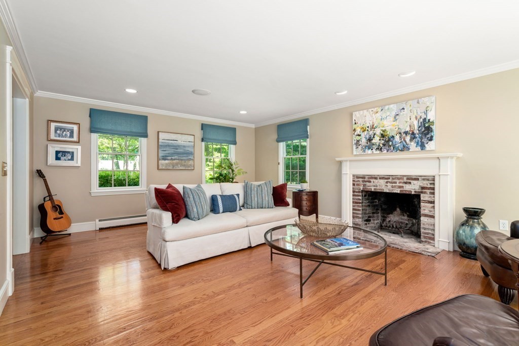 5 Deerfield Road Sherborn, MA 01770 - Photo 14 of 42 a living room with furniture a fireplace and window