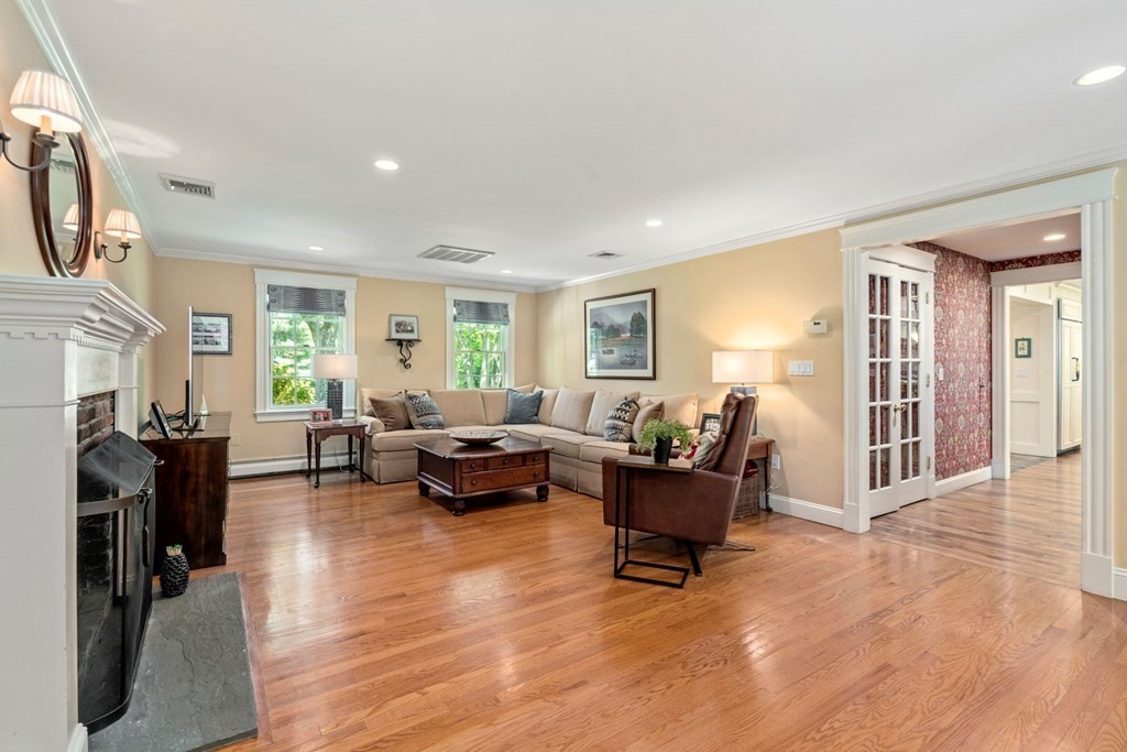 5 Deerfield Road Sherborn, MA 01770 - Photo 19 of 42 a living room with furniture and a window