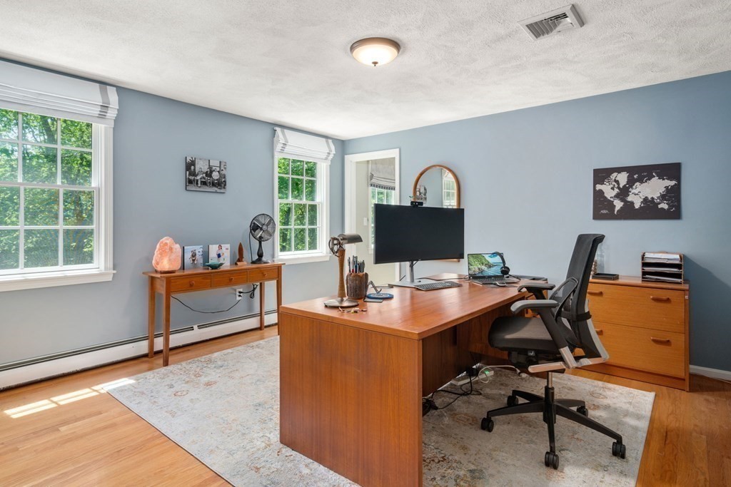 5 Deerfield Road Sherborn, MA 01770 - Photo 33 of 42 a view of a workspace with furniture and a window
